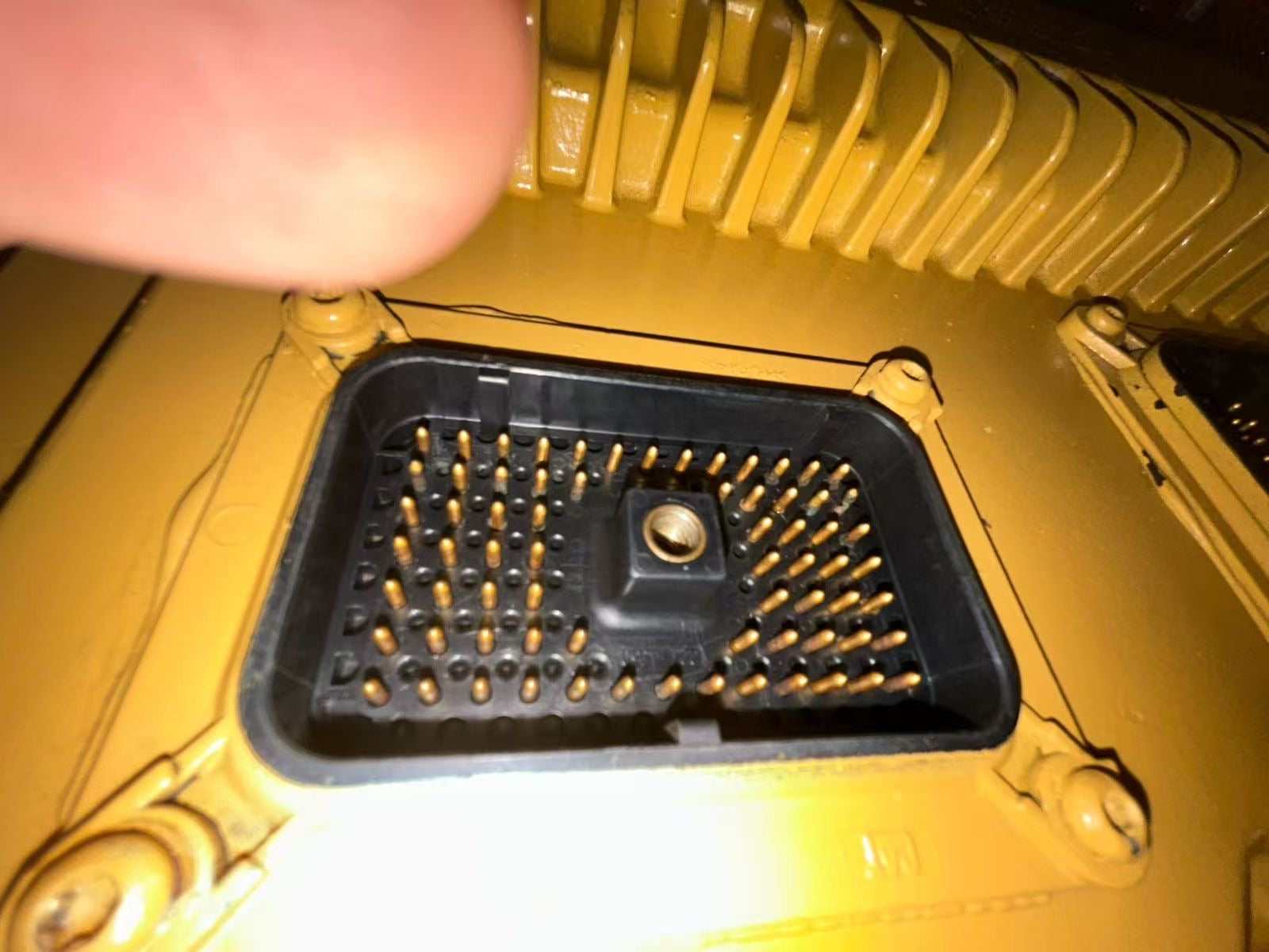 ECM connector pins inspected before bench test